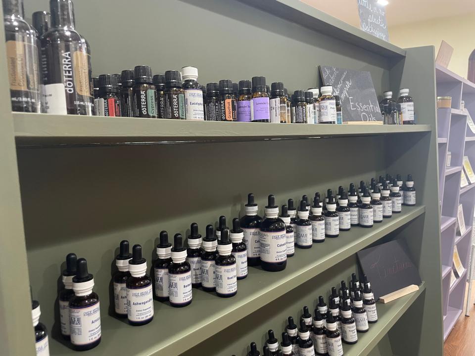 A shelf of essential oils at Amy's Relation to Creation and Botanicals LLC on Oct. 27, 2023.