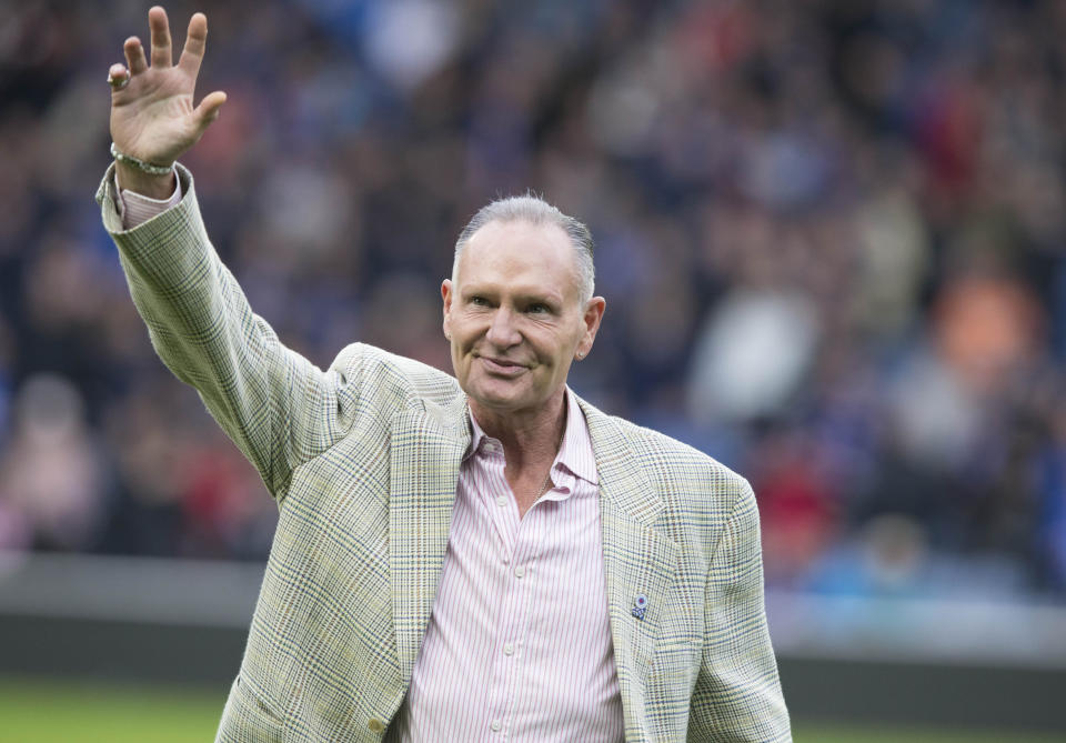 Former Ranger Paul Gascoigne salutes fans on the pitch during the Ladbrokes Scottish Premiership match at Ibrox Stadium, Glasgow.