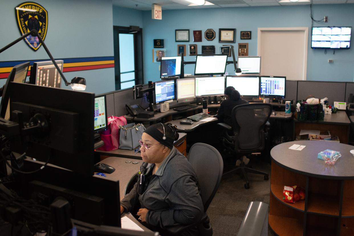 Dispatchers at the Shawnee County Sheriff's Office work to get incoming calls assigned to the proper outlets.