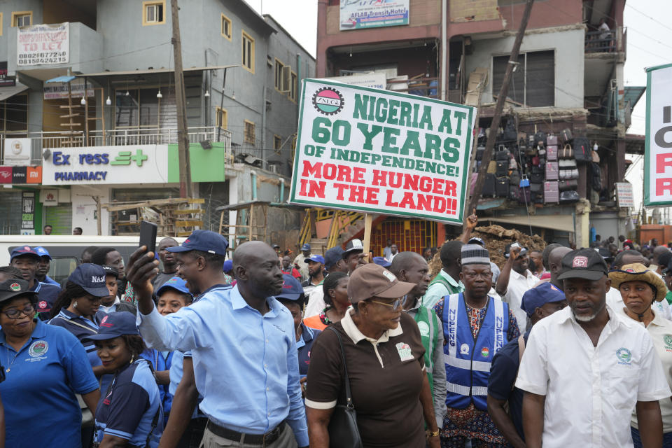 Nigeria Labour union protest in solidarity with the Academic Staff Union of Universities, on the street in Lagos, Nigeria, Tuesday, July 26, 2022. A strike declared by lecturers in Nigerian public universities has now clocked six months, hurting an estimated 2.5 million students who do not have other means of learning. Such strikes are common in this West African nation with more than 100 public universities. (AP Photo/Sunday Alamba)