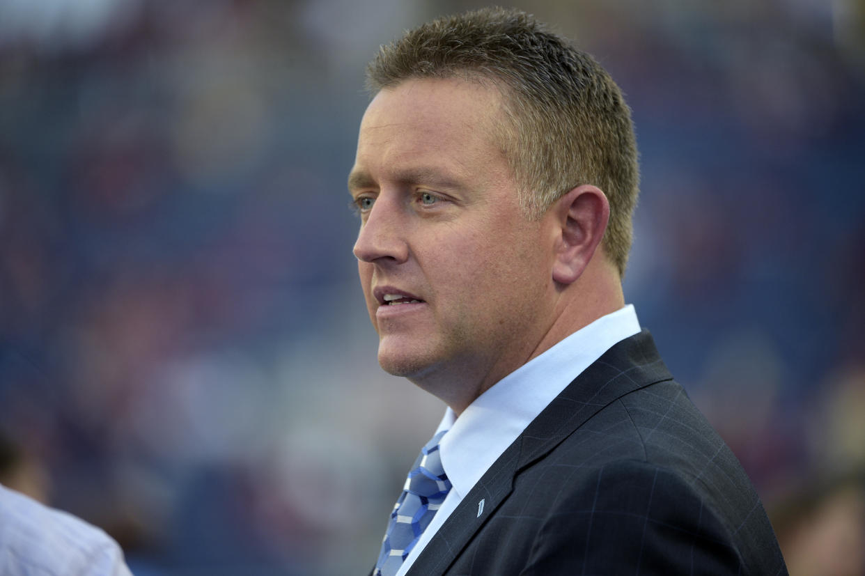 ESPN broadcaster Kirk Herbstreit watches warmups before an NCAA college football game between Florida State and Mississippi in Orlando, Fla., Monday, Sept. 5, 2016. Florida State won 45-34. (AP Photo/Phelan M. Ebenhack)