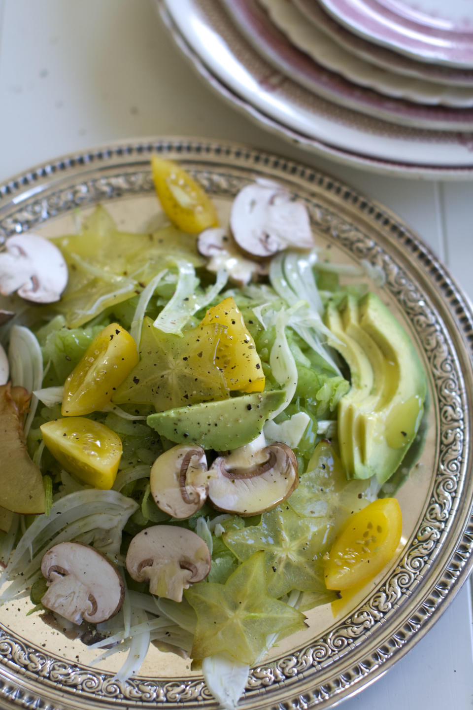 This Nov. 11, 2013 photo shows have-it-your-way celery salad in Concord, N.H. The humble celery stalk - high in fiber and low in calories - provides the foundation for this crunchy salad. Add a lemon vinaigrette, thin ribbons of real Parmigiano-Reggiano cheese and the add-ins of your choice to tailor the dish to your taste. (AP Photo/Matthew Mead)