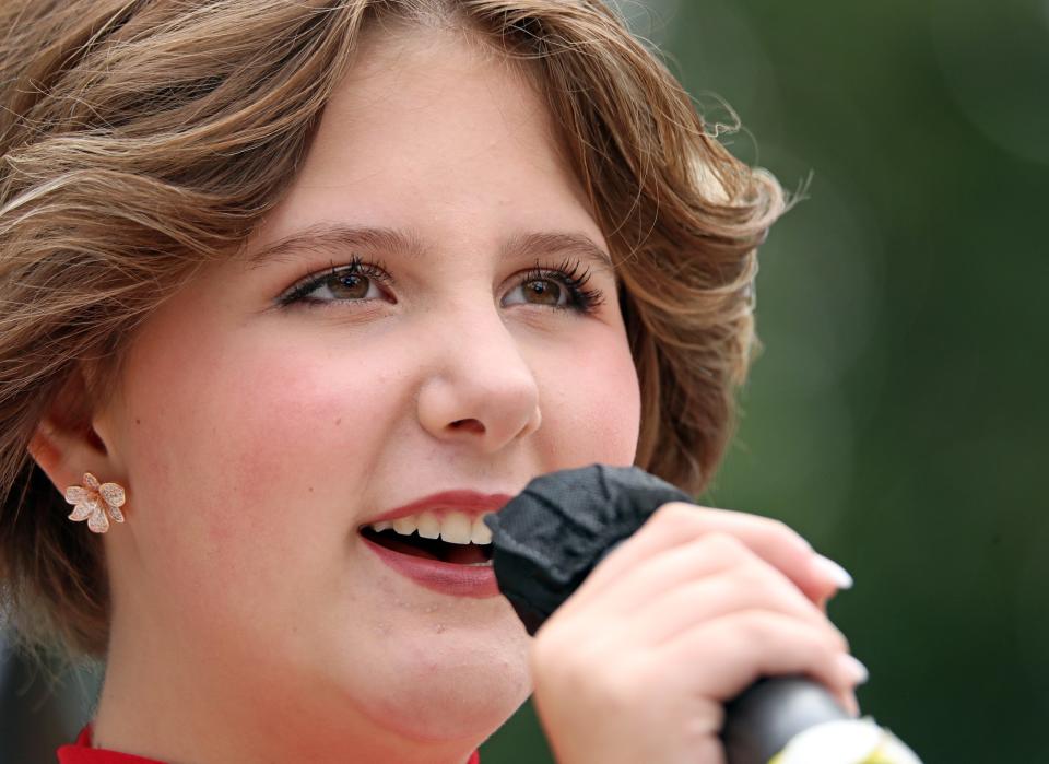 Sprout champion Dawson Huinker, 12, of West Des Moines performs a vocal solo  during the 62nd Bill Riley Talent Search finals on the Anne and Bill Riley Stage at the Iowa State Fair on Sunday, August 21, 2022, in Des Moines. Performers compete in two groups, Sprouts (ages 2-12) and Seniors (ages 13-21).