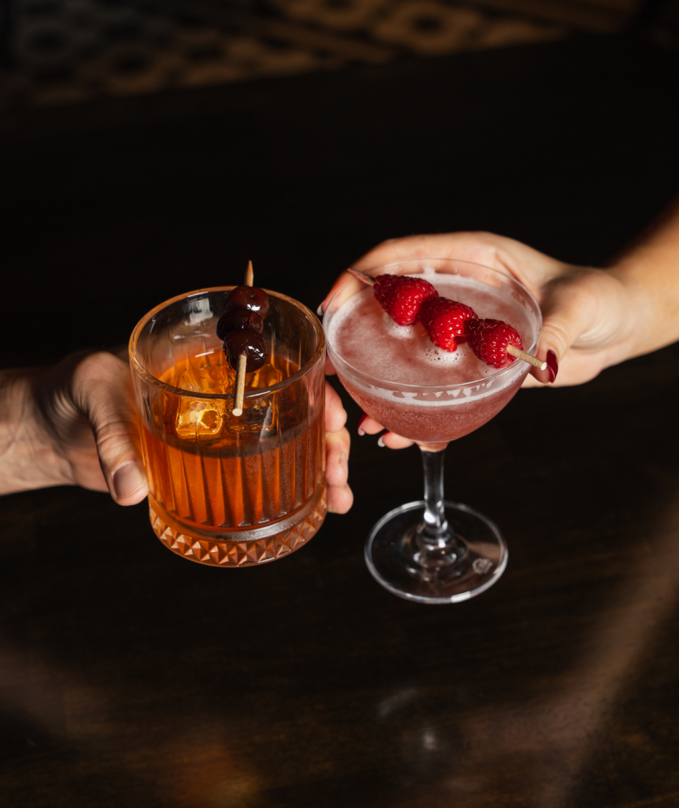 Enjoy "his and her" libations on Valentine's Day with a Manhattan and a a French martini at Warren Delray.