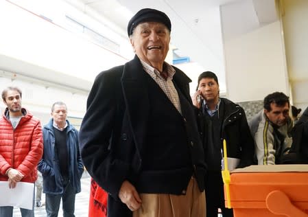 Uruguay's former President Julio Maria Sanguinetti of the Colorado Party smiles before casting his vote during primary elections ahead of the presidential elections later this year, in Montevideo