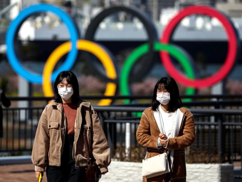 People wearing protective face masks, following an outbreak of the coronavirus, are seen in Tokyo: REUTERS