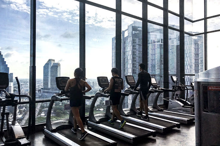 Gym members on treadmills — Pictures by CK Lim