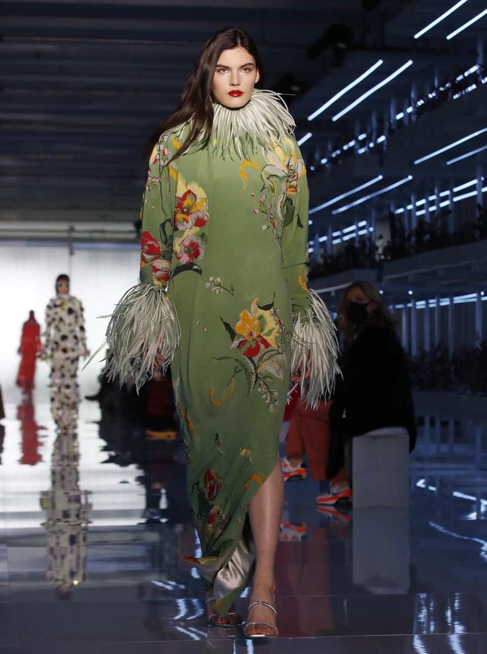 A model wears a creation as part of the Daniel Del Core women's and men's Fall Winter 2021-22 collection, unveiled during the Fashion Week in Milan, Italy, Wednesday, Feb. 24, 2021. (AP Photo/Antonio Calanni)