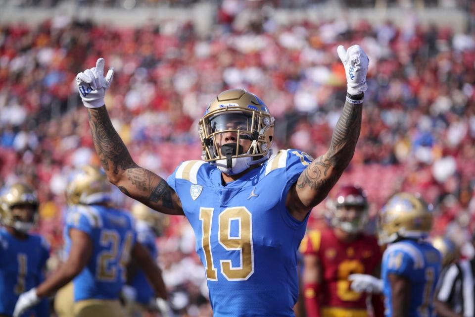 UCLA running back Kazmeir Allen celebrates a touchdown against USC at the Coliseum in November.