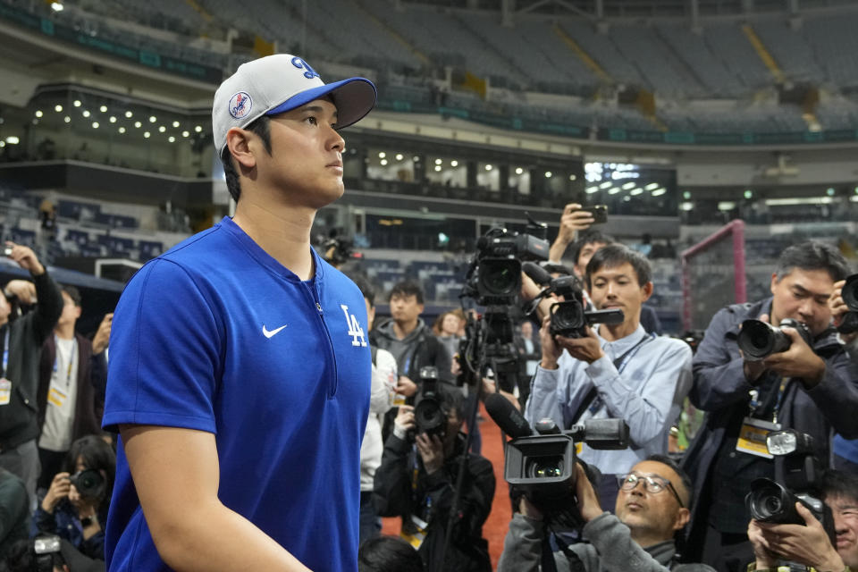 Los Angeles Dodgers' Shohei Ohtani takes the field for a baseball workout at the Gocheok Sky Dome in Seoul, South Korea, Saturday, March 16, 2024. (AP Photo/Ahn Young-joon)