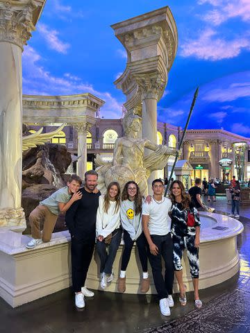 <p>Brooke Burke</p> Brooke Burke and fiancé Scott Rigsby pose with four of their children in Las Vegas during a visit to Burke's show, 'Penn & Teller: Fool Us'