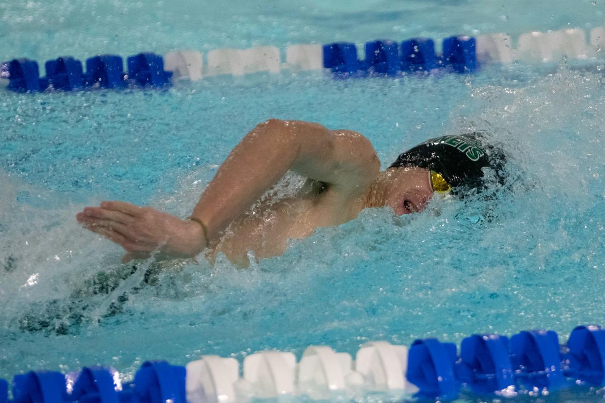 Pueblo County’s Garrett Dyleski competes in the 100-yard freestyle event during a dual at Pueblo Central on Tuesday, April 12, 2022.