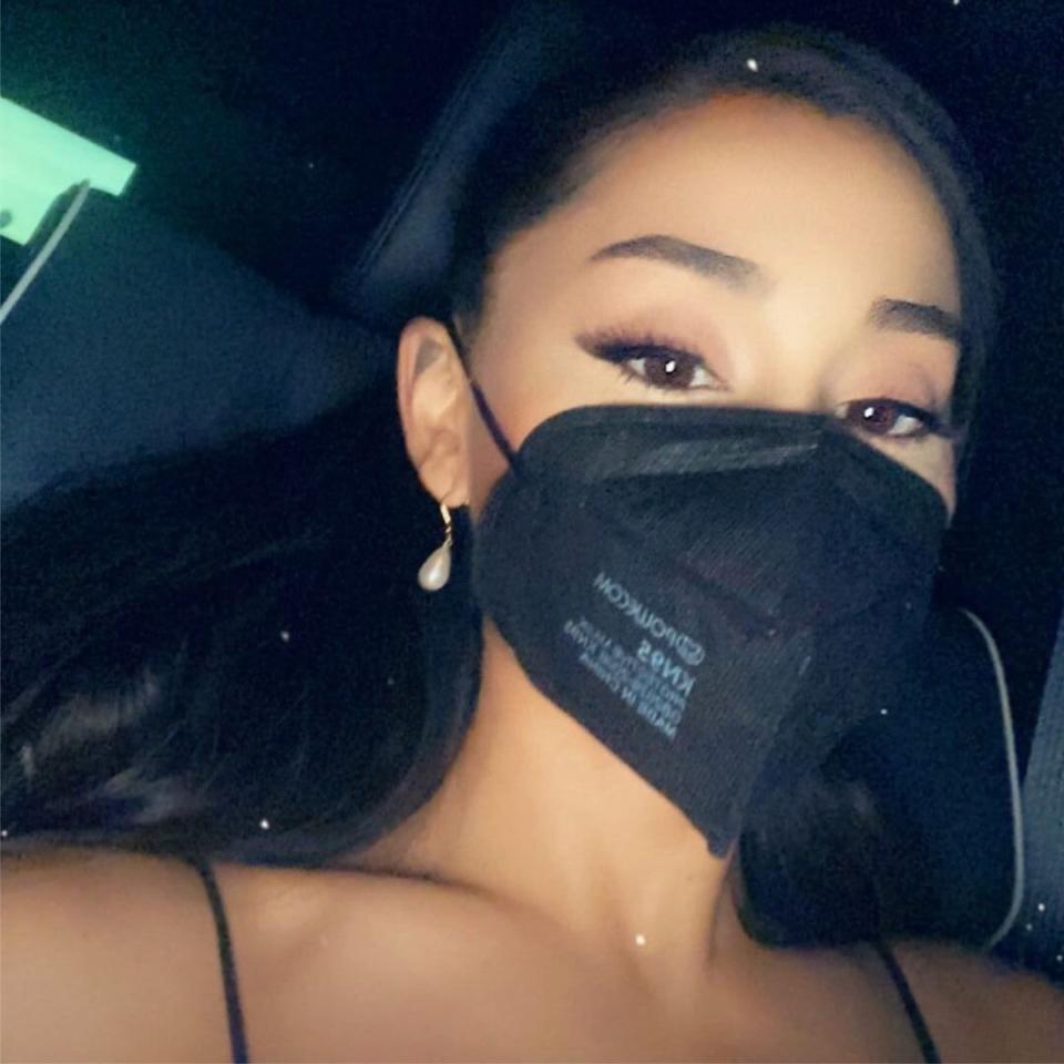 ariana grande vaxxed and masked