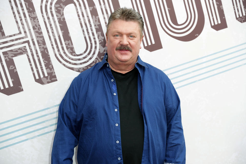 FILE - This Aug. 22, 2018 file photo shows Joe Diffie at the 12th annual ACM Honors in Nashville, Tenn. A publicist for Diffie says the country singer has tested positive for COVID-19. Diffie is under the care of medical professionals and is receiving treatment. (Photo by Al Wagner/Invision/AP, File)