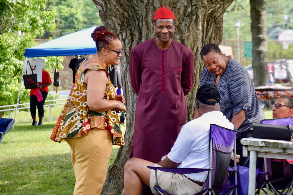 People chat at Staunton's third annual Juneteenth celebration on June 22, 2019.