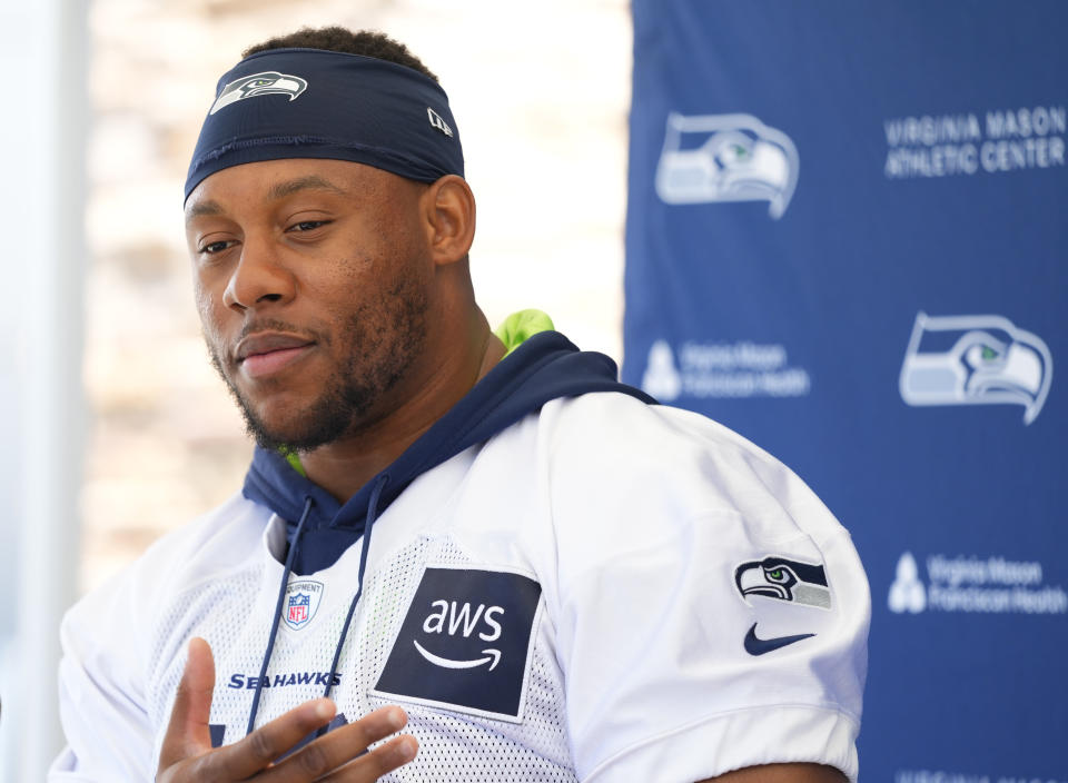 Seattle Seahawks linebacker Uchenna Nwosu speaks during a press availability after signing a three-year contract extension with $32 million guaranteed, before the NFL football team's training camp, Wednesday, July 26, 2023, in Renton, Wash. (AP Photo/Lindsey Wasson)