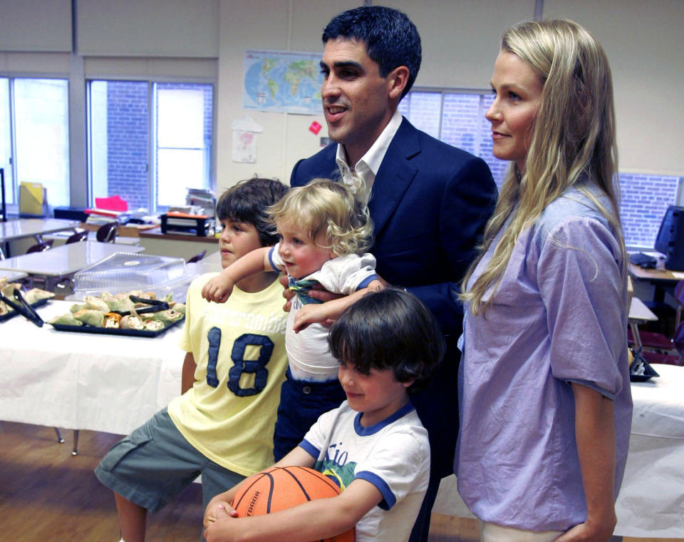 FILE - New York Red Bulls midfielder Claudio Reyna, top left and his wife, Danielle, right, pose with their sons, from bottom left to right, Jack, 9, Joah, 17 months, and Giovanni, 5, before a news conference in Newark, N.J., July 16, 2008, to announce Reyna's retirement from soccer. The firm Alston and Bird was retained after former U.S. captain Claudio and wife Danielle, the parents of current U.S. midfielder Gio, went to the USSF with allegations of the 1992 incident following the decision by Berhalter to use Gio sparingly at last year’s World Cup. (AP Photo/Mike Derer, File)