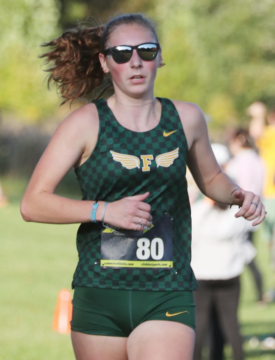 Firestone's Sarah Schueler wins the City Series cross country championship at Goodyear Heights Metro Park, Wednesday, Oct. 11, 2023.