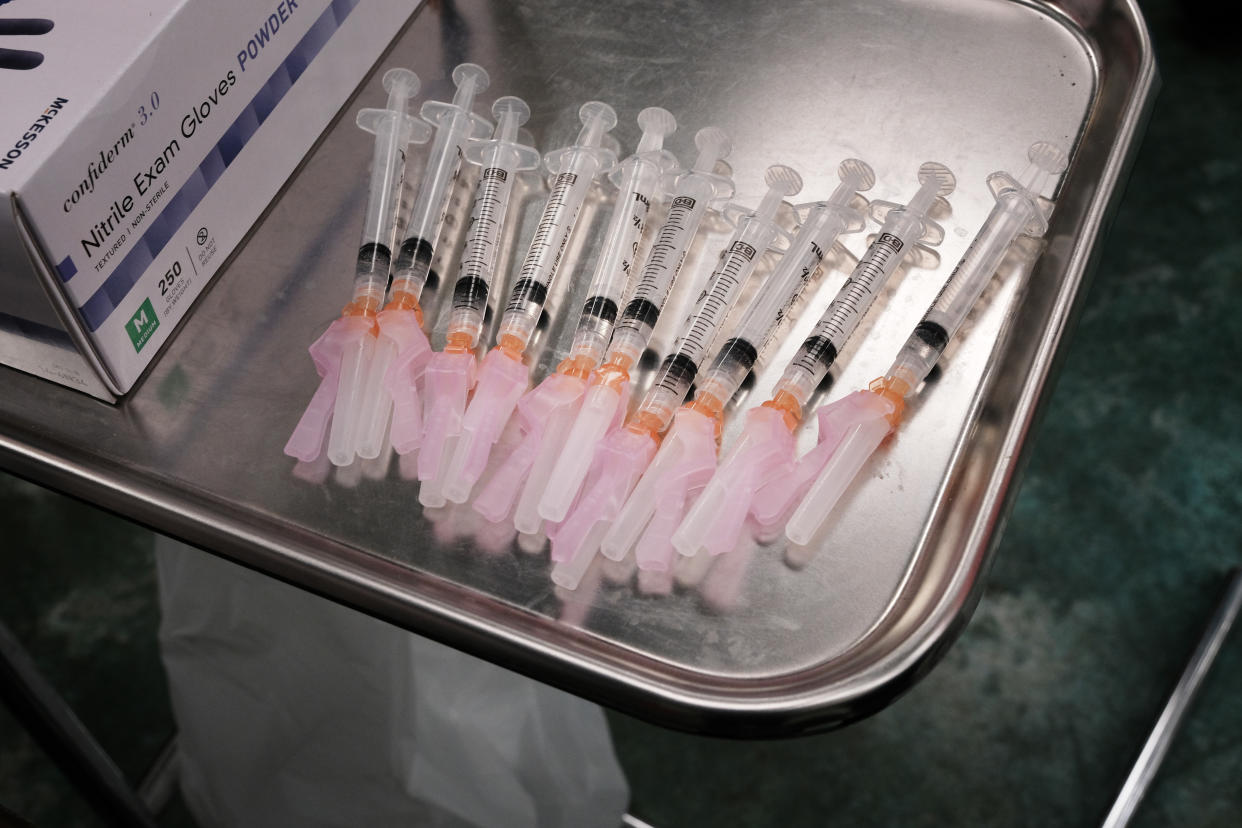 Vaccine doses are prepared as prisoners at the Bolivar County Correctional Facility receive a Covid-19 vaccination administered by medical workers with Delta Health Center  on April 28, 2021 in Cleveland, Mississippi. (Spencer Platt/Getty Images)