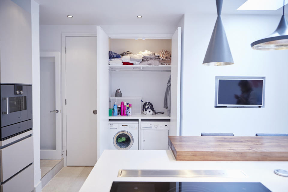 10. Create a larger laundry space behind double doors
