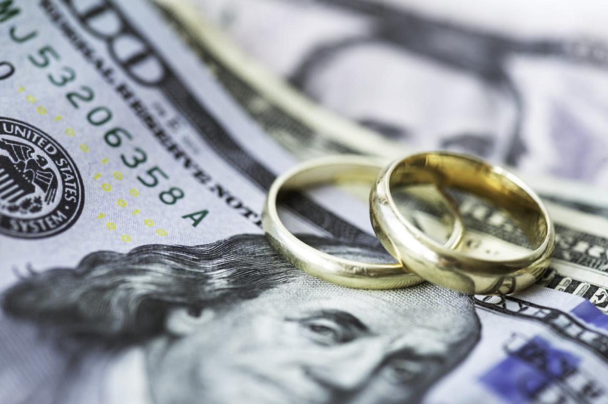 Wedding planning involves major conversations about finances – but certainly not the couple's last. <a href="https://www.gettyimages.com/detail/photo/divorce-process-royalty-free-image/1329914655?phrase=wedding+expense&adppopup=true" rel="nofollow noopener" target="_blank" data-ylk="slk:simarik/iStock via Getty Images Plus;elm:context_link;itc:0;sec:content-canvas" class="link ">simarik/iStock via Getty Images Plus</a>