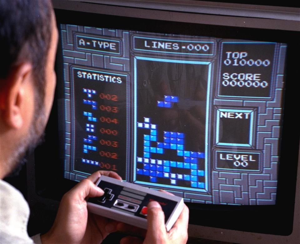 Tetris, an addictive brain-teasing video game, is shown as played on the Nintendo Entertainment System in New York, June 1990. Created by a Soviet scientist, Tetris is the first Communist bloc video game to hit it big in the free market.