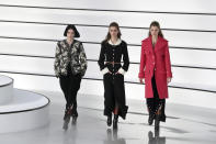 Models wear creations for the Chanel fashion collection during Women's fashion week Fall/Winter 2020/21 presented in Paris, Tuesday, March 3, 2020. (AP Photo/Thibault Camus)