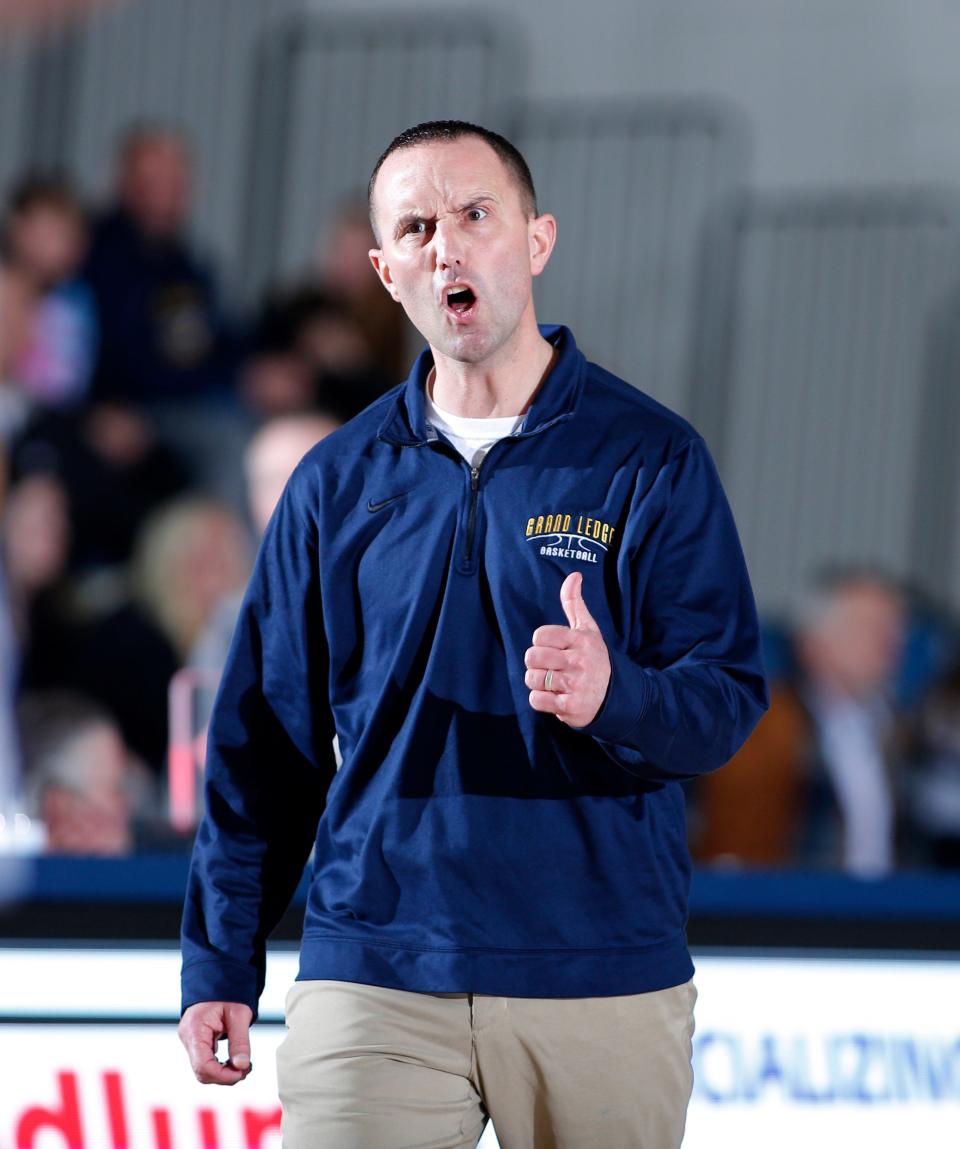 Grand Ledge coach Travis Schellhammer gives instructions against East Lansing, Friday, March 11, 2022, at DeWitt High School. East Lansing won 57-44.