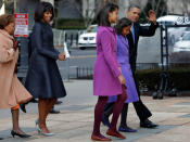 This is the second time Obama has worn Thom Browne, having worn a dress by the label for the third presidential debate in 2012. According to the New York Times, "Thom Browne's coat and dress for Michelle Obama are both made of silk jacquard based on a necktie fabric, custom made for the First Lady." (AP Photo/Jacquelyn Martin)