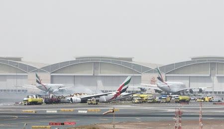 An Emirates Airline flight is seen after it crash-landed at Dubai International Airport, the UAE August 3, 2016. REUTERS/Stringer