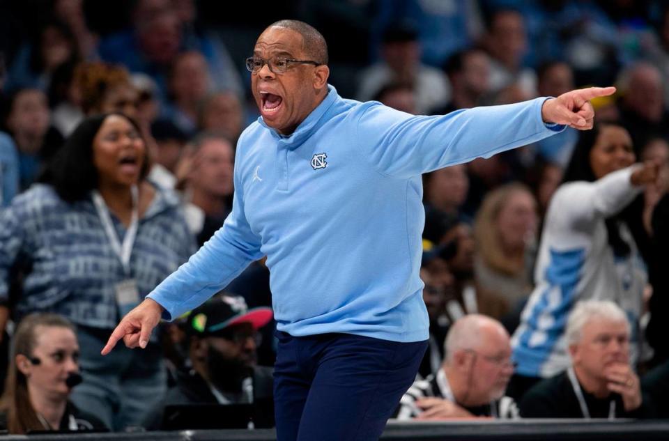 North Carolina coach Hubert Davis reacts after not getting a foul call against Michigan during the first on Wednesday, December 21, 2022 at the Spectrum Center in Charlotte, N.C.