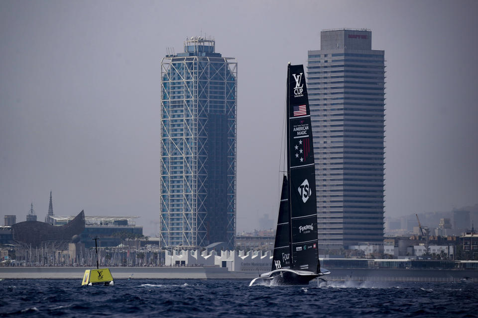 American Magic's AC75 boat sails during America's Cup Preliminary Regatta ahead of the 37th America's Cup sailing race at the Barcelona's coast, Spain, Thursday, Aug. 22, 2024. The world's oldest international sports trophy, best yachtsmen and cutting-edge design and technology will come together in Barcelona when the 37th edition of the America's Cup starts on Thursday. (AP Photo/Joan Monfort)