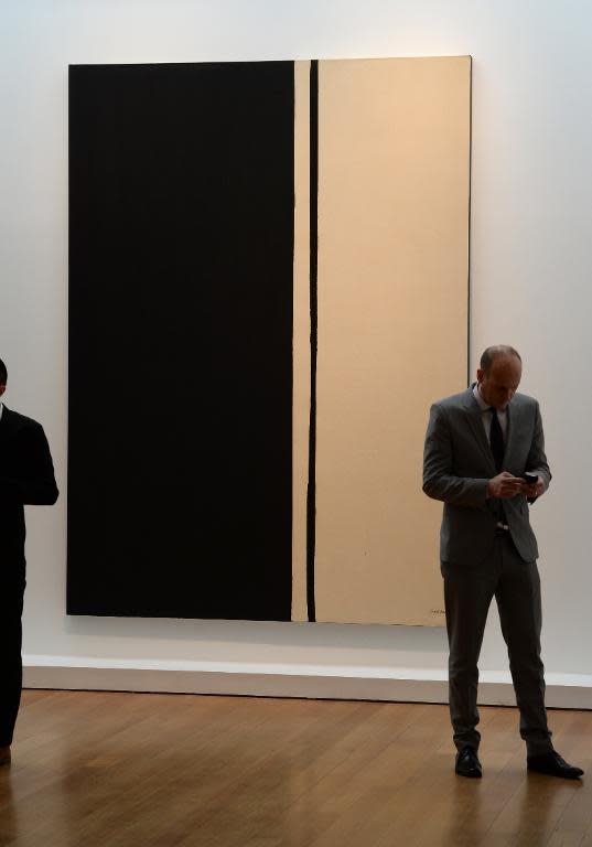 Barnett Newman's 'Black Fire I', painted in 1961, seen during a preview of the Impressionist and Modern Art sale at Christie's, on May 2, 2014