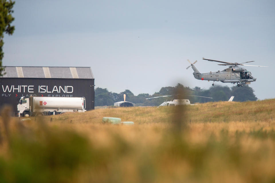 A military helicopter departs Whakatane airport during the recovery. Source: AAP