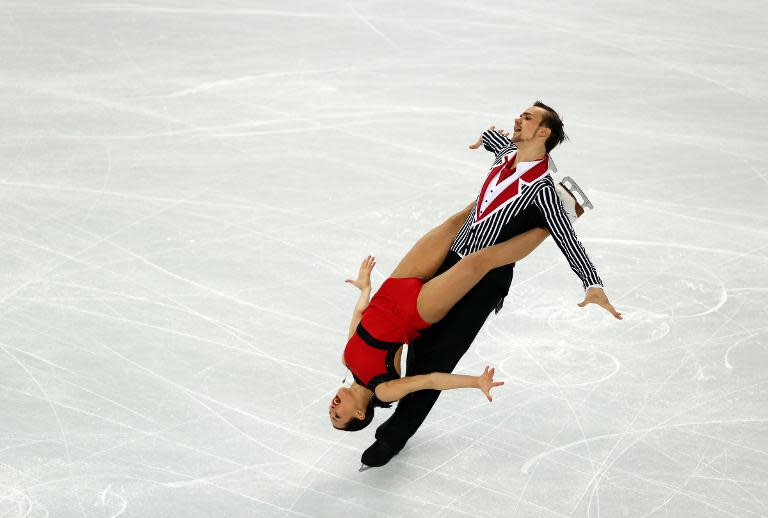 Russia's Ksenia Stolbova and Fedor Klimov perform in the Figure Skating Pairs Team Free Program at the Iceberg Skating Palace during the 2014 Sochi Winter Olympics on February 8, 2014
