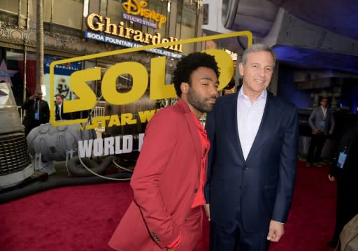 Disney CEO Bob Iger -- shown here with "Solo: A Star Wars Story" star Donald Glover at the film's Hollywood premiere in May 2018 -- said last year that the studio would slow down its release schedule for the franchise, and now it has