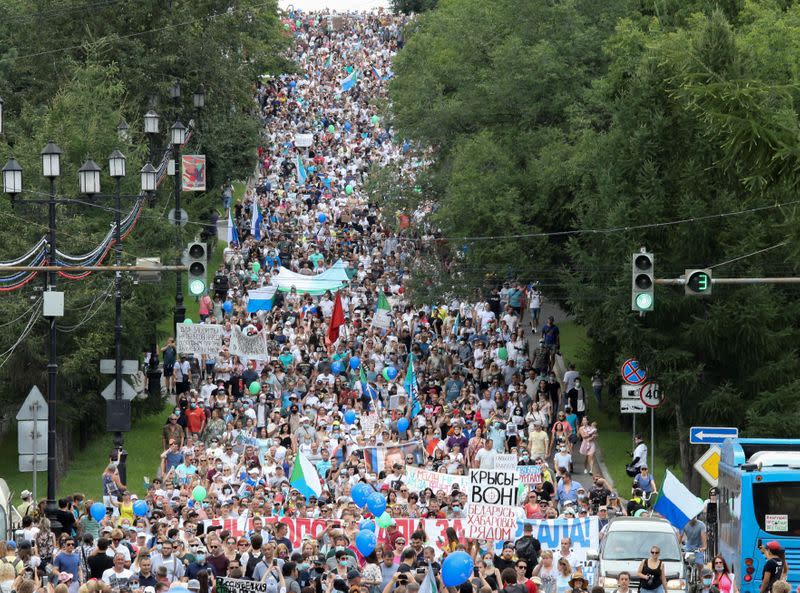 People take part in a rally in support of arrested governor Sergei Furgal in Khabarovsk