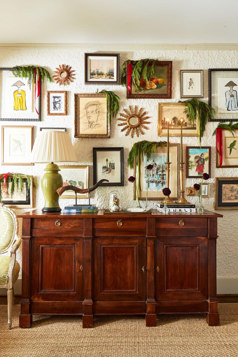 Credenza and Gallery Wall with greenery for Christmas