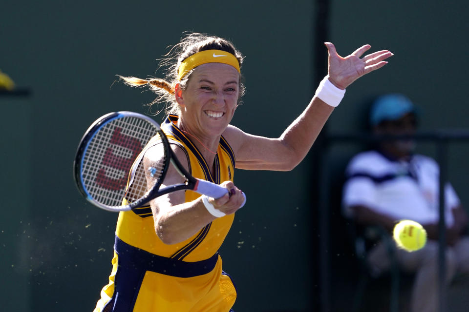 Victoria Azarenka, of Belarus, returns to Paula Badosa, of Spain, in the singles final at the BNP Paribas Open tennis tournament Sunday, Oct. 17, 2021, in Indian Wells, Calif. (AP Photo/Mark J. Terrill)