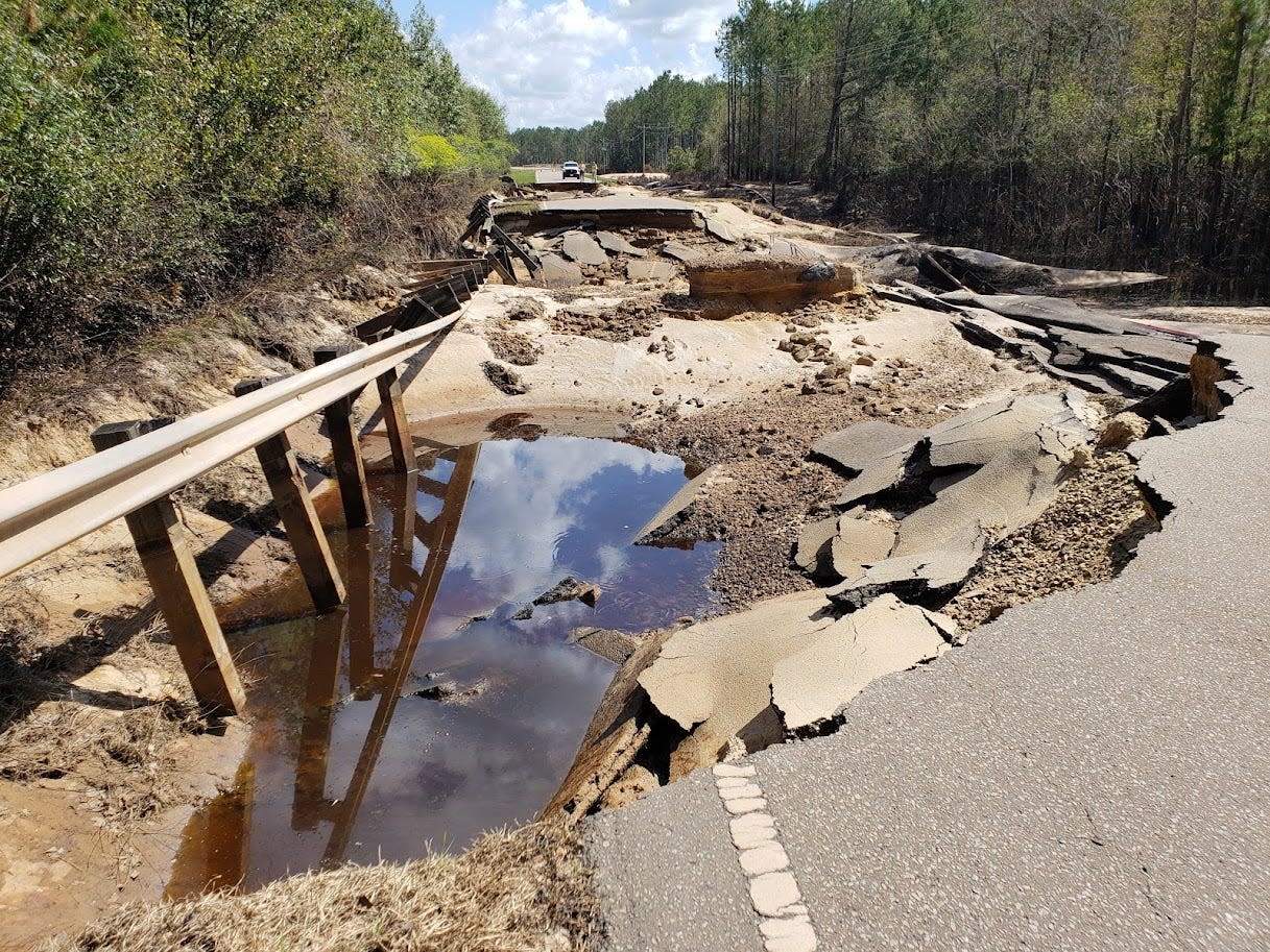 Extreme rainfall from Hurricane Florence in 2018 washed out this section of North Carolina Highway 210 at Moore's Creek. NOAA photo by Carl Morgan, National Weather Service.