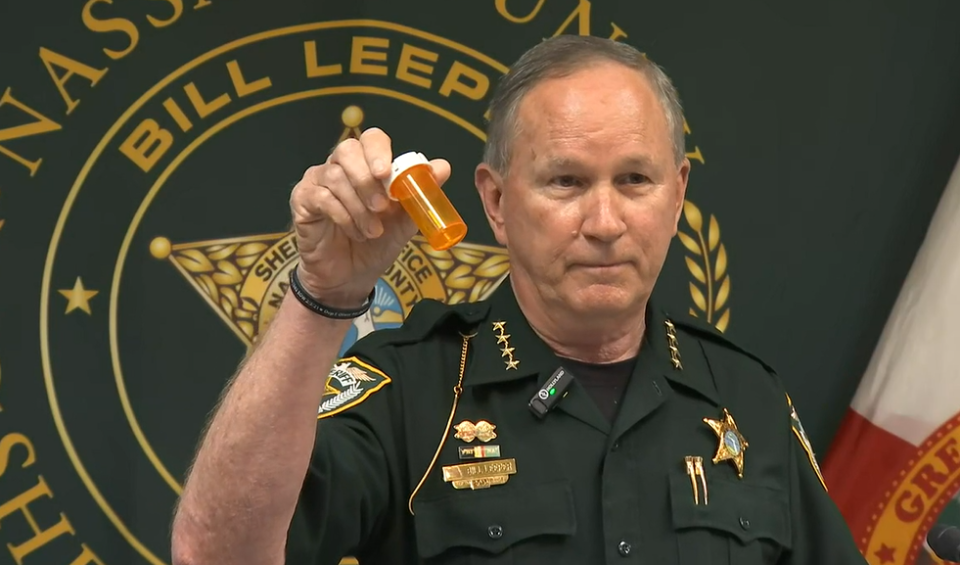 Nassau County Sheriff Bill Leeper holds up a bottle with a scant amount of fentanyl to show how little it takes to be lethal. He was conducting a news conference announcing the arrest of a 17-year-old mother whose baby consumed the deadly drug in his bottle.
