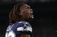 Dallas Cowboys wide receiver CeeDee Lamb (88) reacts after scoring a touchdown against the New York Giants during the fourth quarter of an NFL football game, Monday, Sept. 26, 2022, in East Rutherford, N.J. (AP Photo/Adam Hunger)