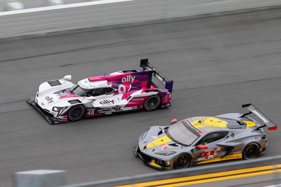 DAYTONA BEACH, FL - JANUARY 23: The #49 Ally Cadillac Racing Cadillac DPi of Jimmie Johnson, Kamui Kobayashi, Simon Pagenaud, and Mike Rockenfeller and the #4 Corvette Racing Corvette C8.R of Nick Tandy, Tommy Milner and Alexander Sims during a practice session during the Roar Before the Rolex 24 on January 23, 2021 at Daytona International Speedway in Daytona Beach, Fl. (Photo by David Rosenblum/Icon Sportswire via Getty Images)