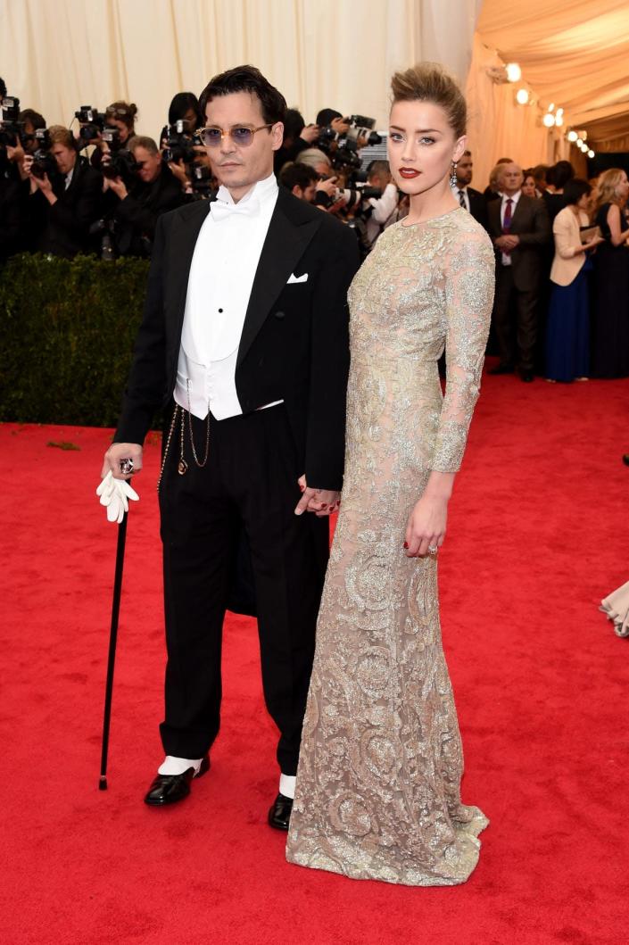 <div class="inline-image__caption"><p>Johnny Depp and Amber Heard attend the Met Gala in 2014. </p></div> <div class="inline-image__credit">Larry Busacca</div>