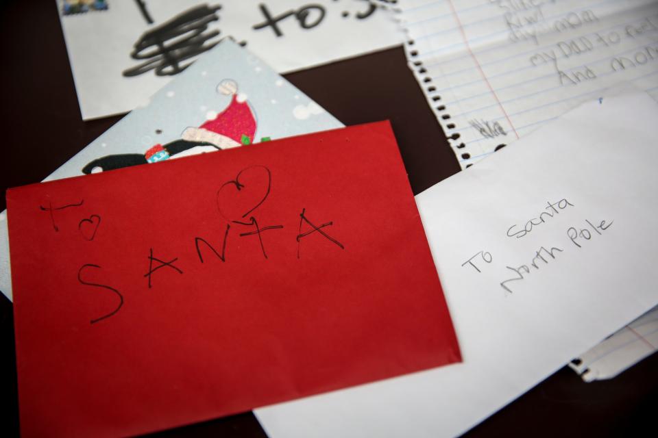 Letters written to Santa by local children are received at the U.S. Post Office as a part of Operation Santa on Friday, Dec. 11, 2020 in Salem, Oregon.
