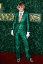 <p>Mary Portas donned an ornate green suit, gold sandals and an orange tie that worked incredibly well with her severe auburn bob. <i>[Photo: Getty]</i> </p>