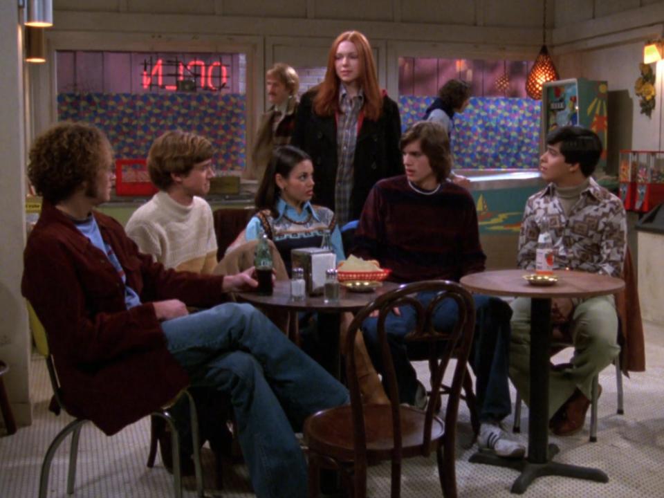 Danny Masterson, Topher Grace, Mila Kunis, Laura Prepon, Ashton Kutcher, and Wilmer Valderrama on season one of "That '70s Show."