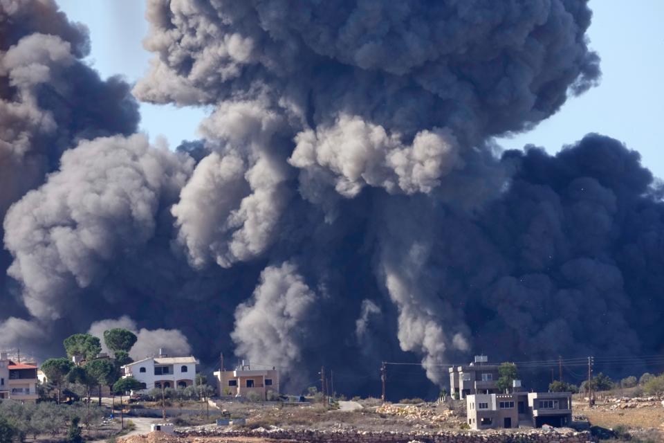 Black smoke rises from an Israeli airstrike on the outskirts of Aita al-Shaab, a Lebanese border village with Israel in south Lebanon, on 4 November. (Copyright 2023 The Associated Press. All right reserved)