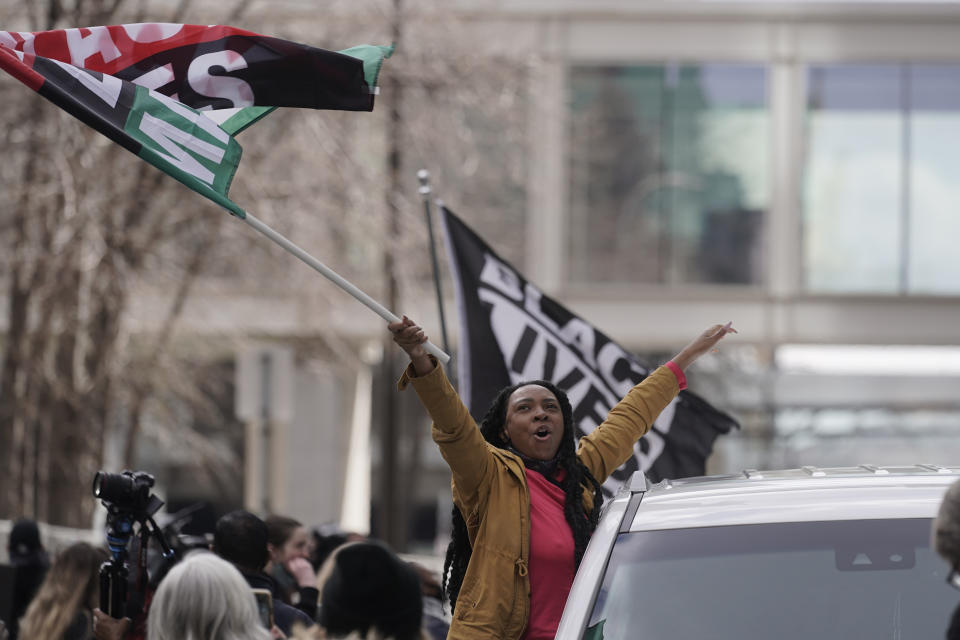 Peoplke cheer after a guilty verdict was announced at the trial of former Minneapolis police Officer Derek Chauvin for the 2020 death of George Floyd, Tuesday, April 20, 2021, in Minneapolis, Minn. Former Minneapolis police Officer Derek Chauvin has been convicted of murder and manslaughter in the death of Floyd. (AP Photo/Morry Gash)