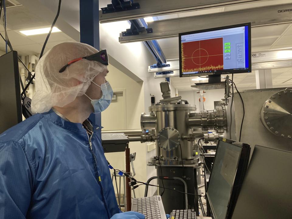 University of Michigan research scientist Andrew McKelvey views a beam alignment camera inside the ZEUS laser facility on Friday, Sept. 2, 2022, in Ann Arbor, Mich. The newly constructed facility will be home to the most powerful laser in the U.S. (AP Photo/Mike Householder)